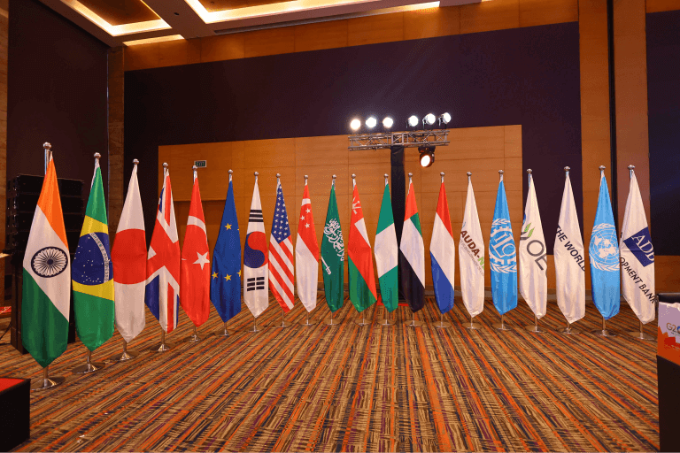 a group of flags are on a wall